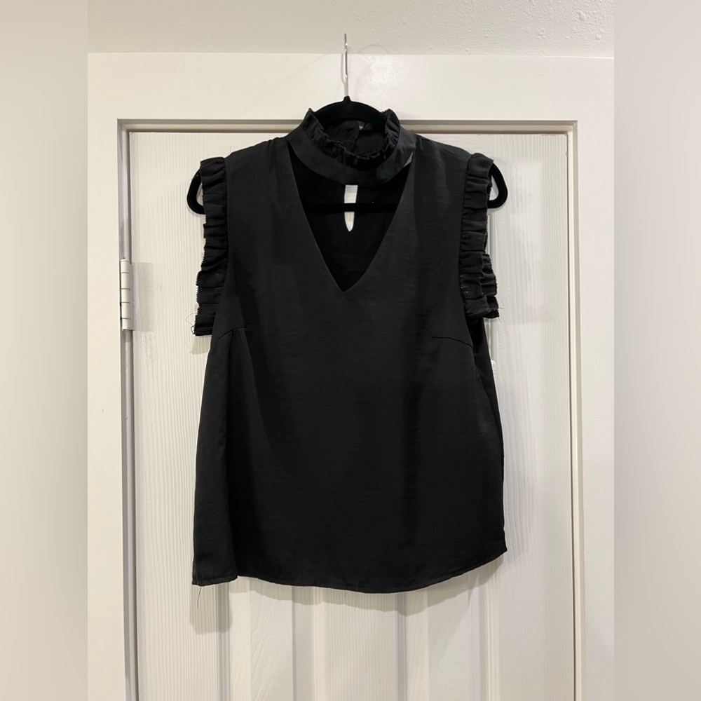 Sleeveless Top with Ruffle Neck and V Cut Out